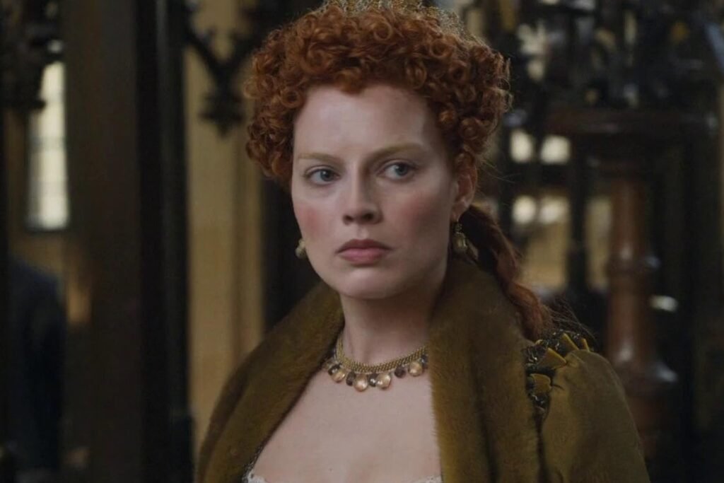 Margot Robbie serving face as Queen Elizabeth in Mary Queen of Scots.