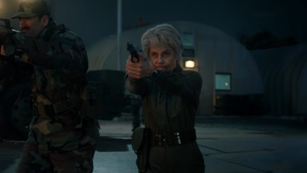 Dr. Kay shooting a pistol in Stranger Things season 5.