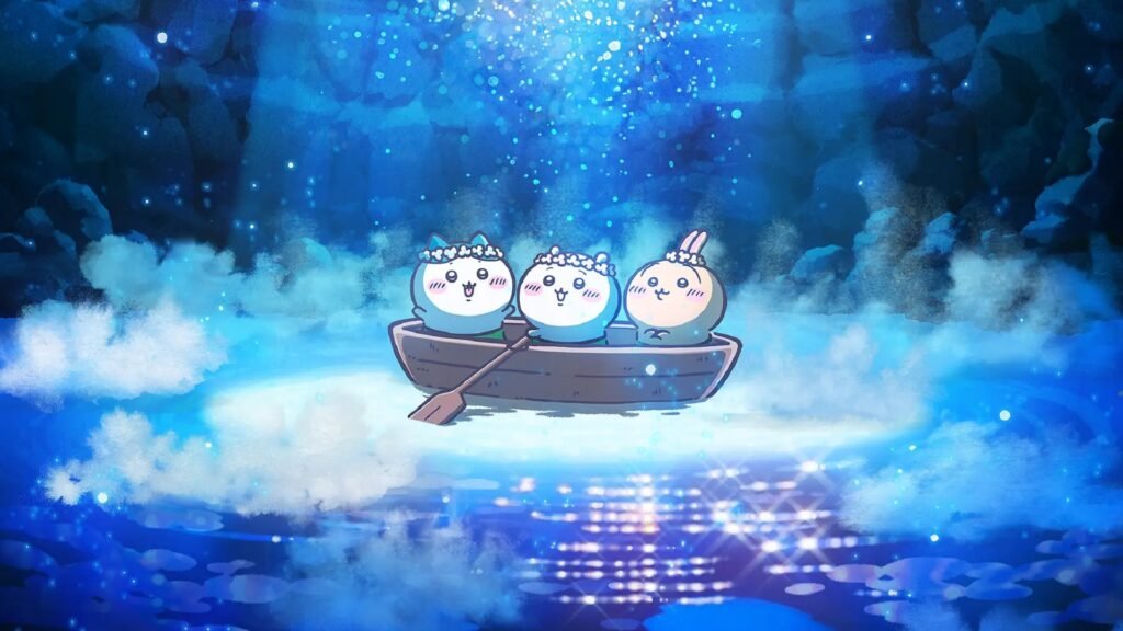 Chiikawa, Usagi, and Hachiware all in a wooden boat on blue sparkly water in a promotional image for Chiikawa The Movie: The Secret of Mermaid Island.