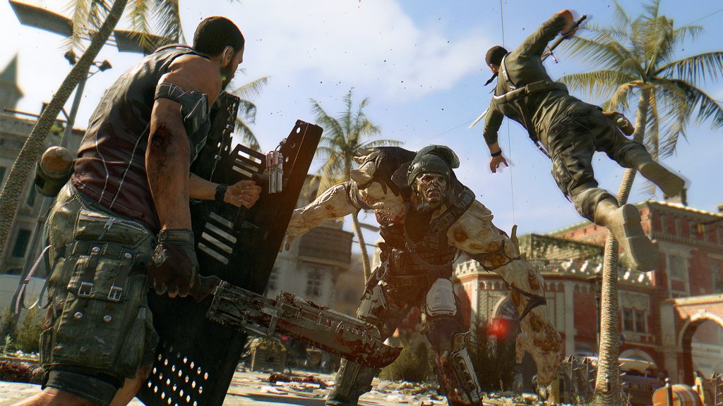 Two humans attack a hulking armored zombie in Dying Light.