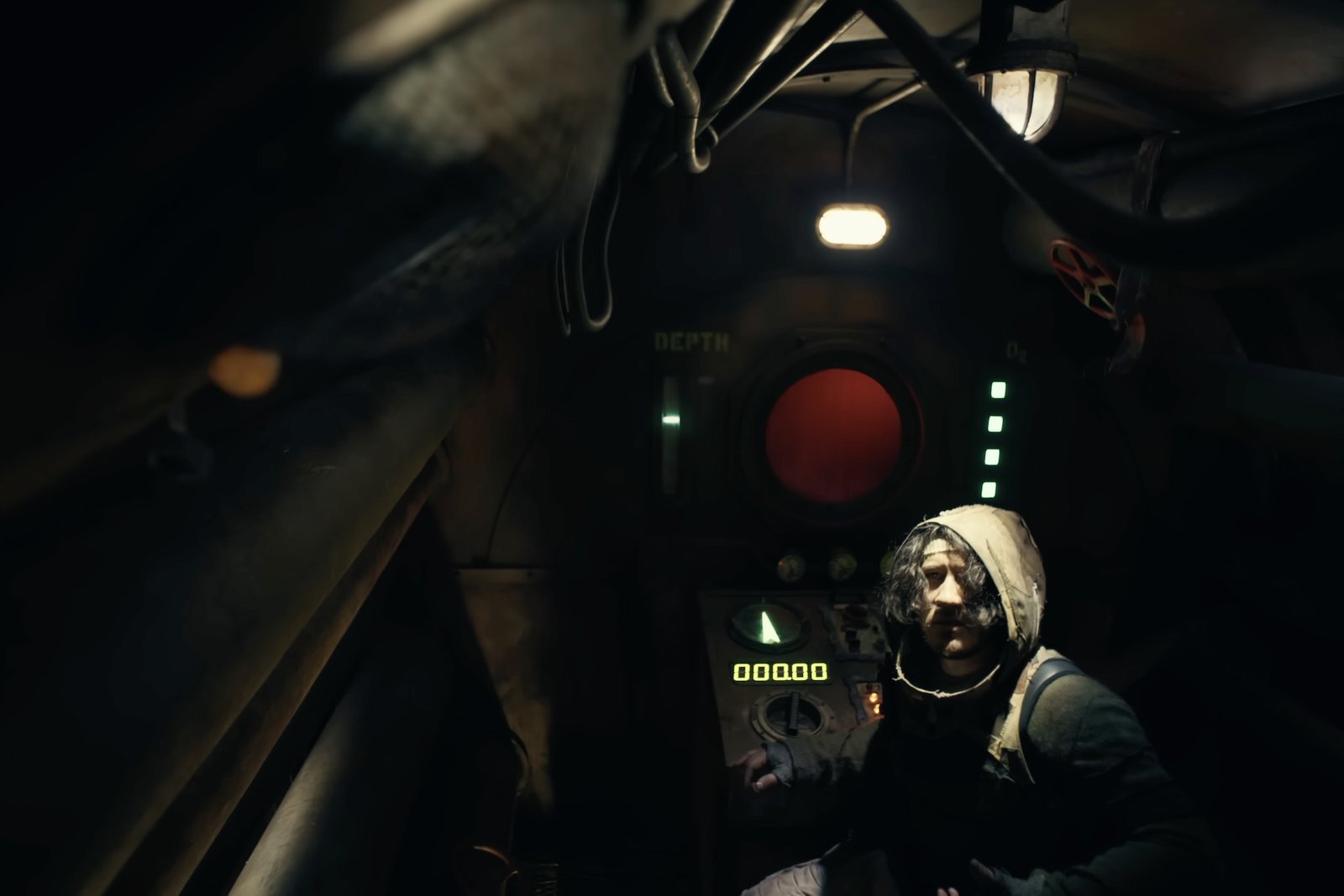 Simon from Iron Lung sat at the controls and looking back at the speaker in the sub