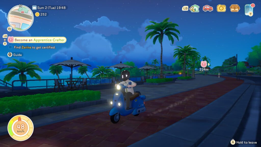 A moped or scooter being driven around Starsand Island at night.