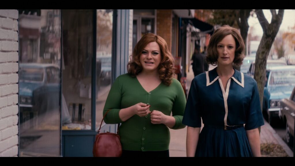 Anna Madrigal and a friend walking down the street in Netflix's Tales of the City.
