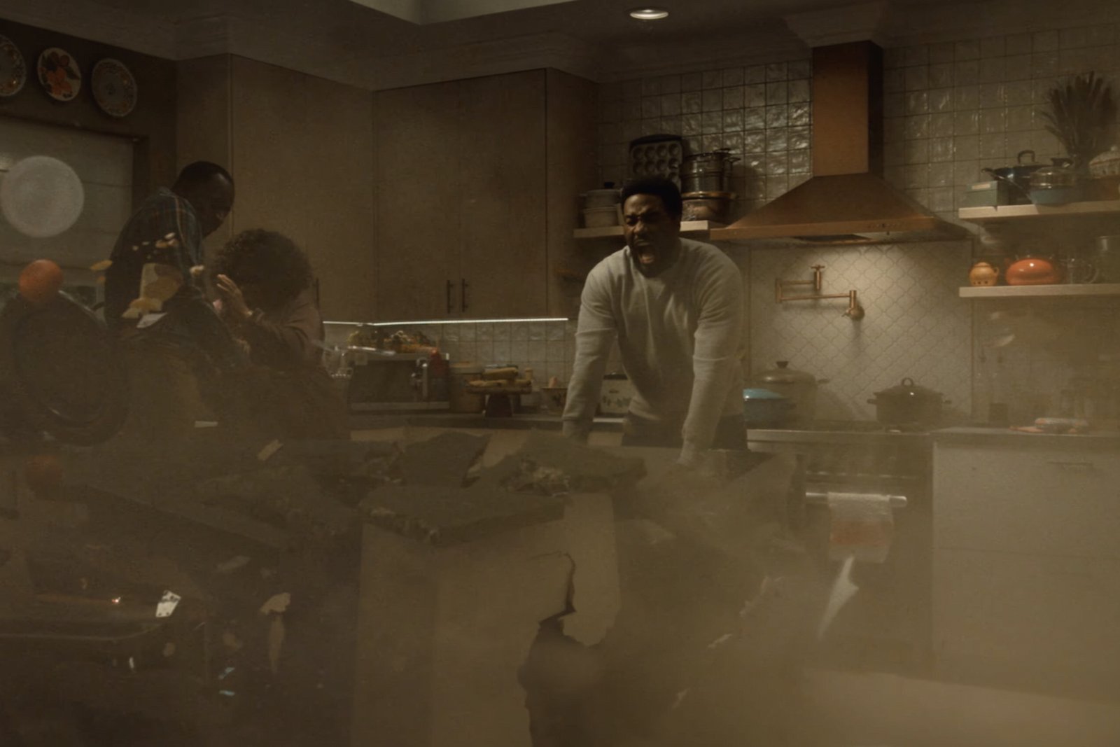 Simon Williams using his powers as Wonder Man and breaking a table