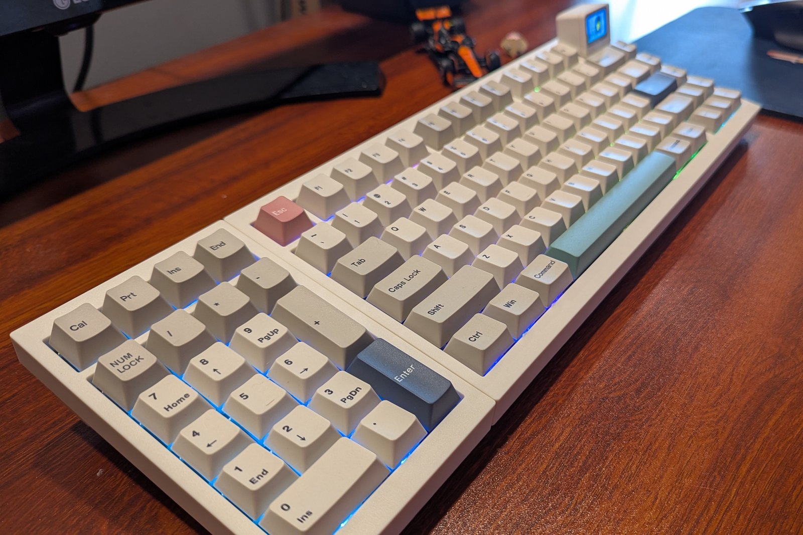epomaker Rt98 keyboard on desk with a view from the left