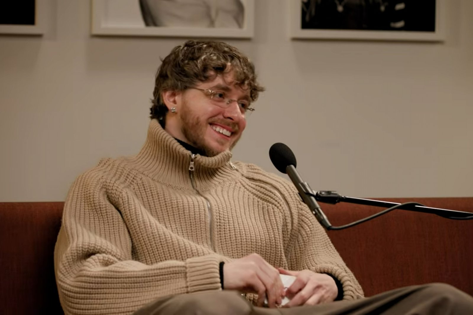 Jack Harlow smiling while speaking with the Popcast podcast
