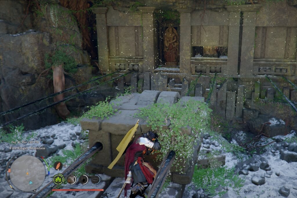 Kliff pushes a stone block that causes a hidden wall to open up in Crimson Desert.