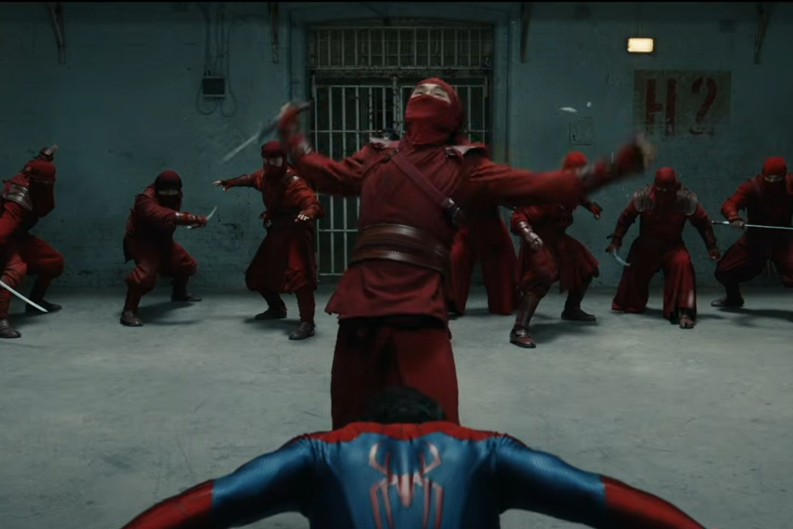 Spider-Man breaking away from a ninja's sword