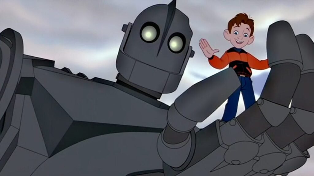Image from The Iron Giant. The Iron Giant is holding Hogarth in his hand.